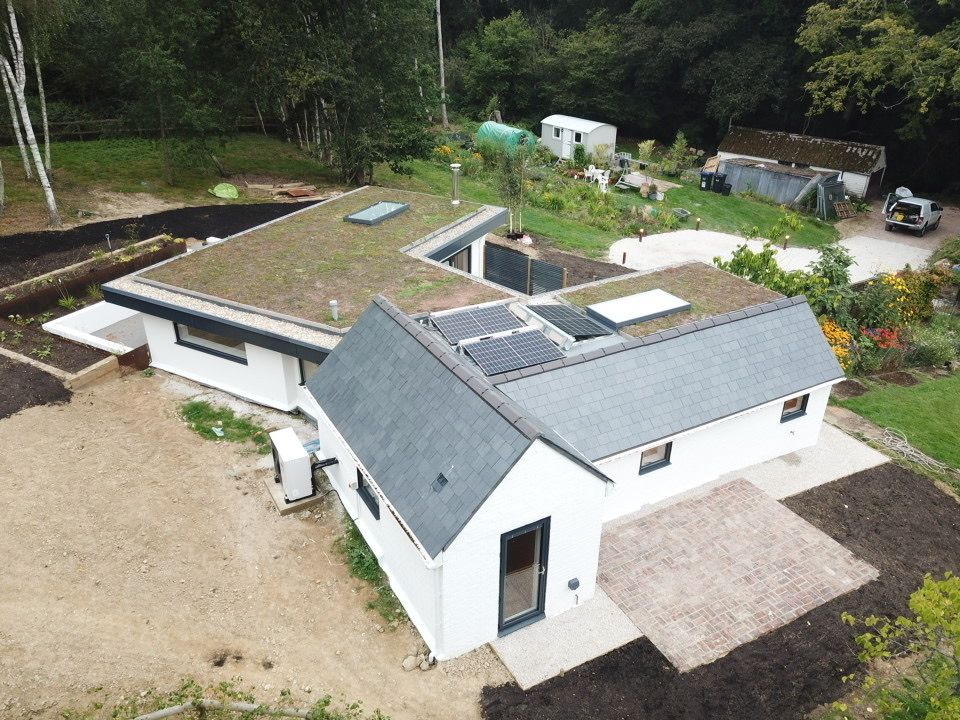 Aerial view of the finished Bolney new-build home and gardens